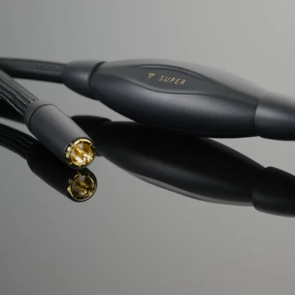 Close-up of a black braided audio cable with a gold-plated circular connector and a gray inline housing labeled 'SUPER'.