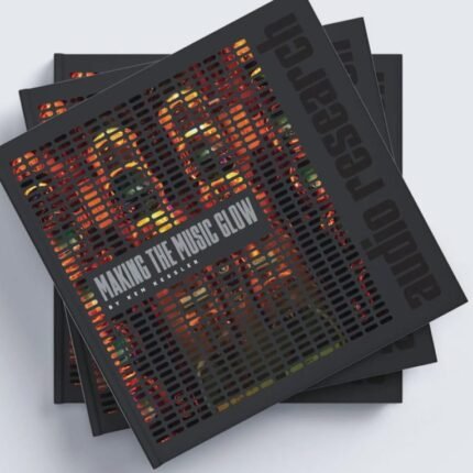 Stack of black magazines with a perforated cover revealing colorful glow and the title 'Making the Music Glow.'