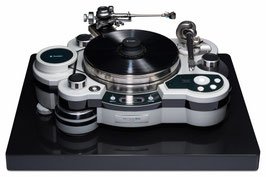 High-end vinyl turntable on a black base with silver dials and a tonearm.
