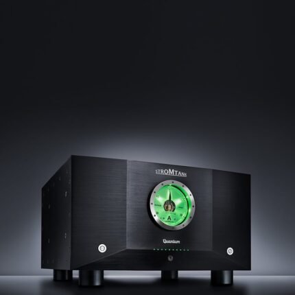 Black audio amplifier with a bright green circular gauge on the front panel and small indicator lights beneath it